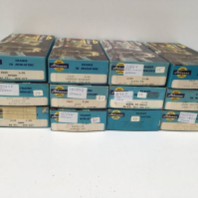 A collection of 12 boxed HO gauge model railway wagons by Athearn. No reserve