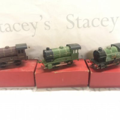 A Collection Of Boxed 0 Gauge Including 3 Locos. Wagons And Accessories. Some Loose And Track.(5).