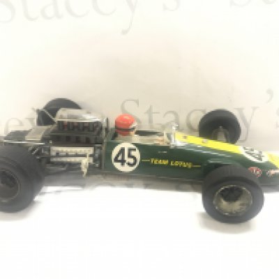 A Tinplate Battery Operated Japanese Made Model Of A Lotus 49 Ford F-1 Racing Car.