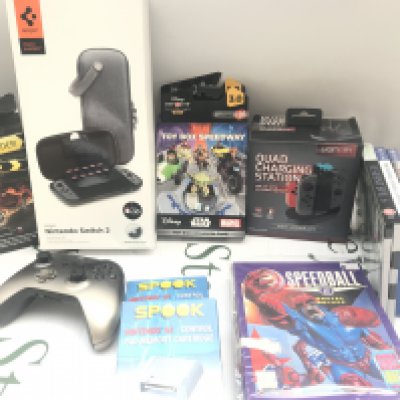 A Box Containing Various Computer Games. Accessories And Magazines.No Reserve. (2).