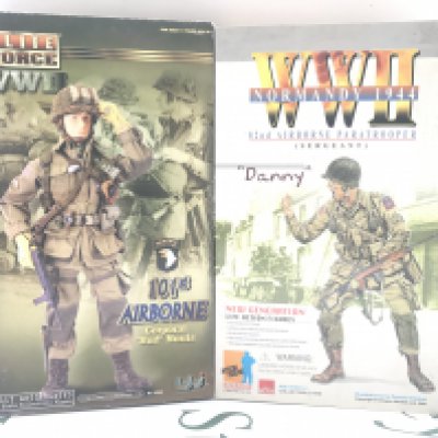 2 X Boxed Military Figures. A Blue Box Toys 101st Airborne Corporal Bud Norris And A Dragon Models 82ND Airborne Danny. No Reserve.