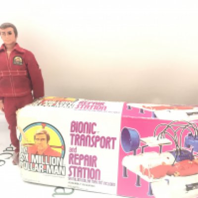 A Six Million Dollar Man Figure And A Boxed Bionic Transport And Repair Station. Box Is Worn. No Reserve.