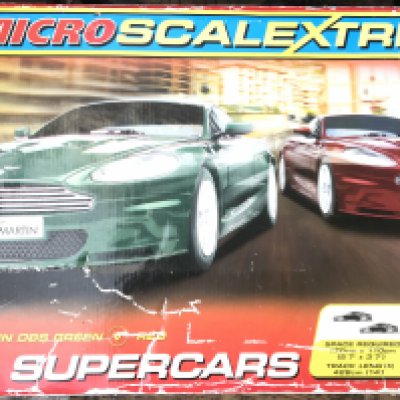 A Collection Of Loose Scalextric And A Micro Scalextric DBS Supercars. (2)