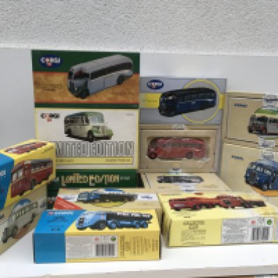 A collection of 14 boxed Corgi Classics featuring buses and commercials some limited edition withCOA. No reserve