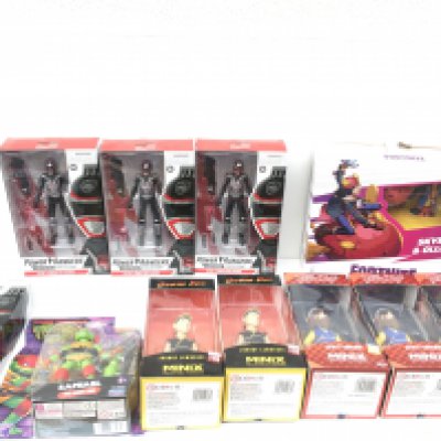 A collection of 11 boxed and unopened action figures featuring Hasbro Power Rangers from the Lightening Collection.. Teenage Mutant Ninja Turtle. Raphael by Playmates..Johnny Lawrence Cobra Kai by Minix..Scott Howard Teen Wolf by Minix and Skye and Ollie Fortnite victory royals series by Hasbro.