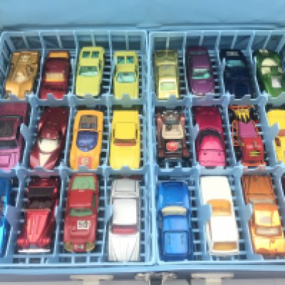 A Matchbox Carry Case Containing A Collection Of Diecast Including Husky. Corgi. Matchbox.