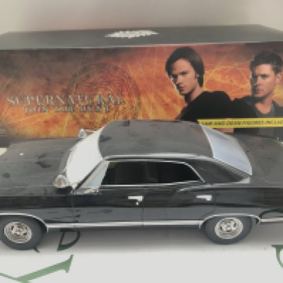 A Boxed Green Light Supernatural 1967 Chevrolet Impala Sport Sedan. 1/28 Scale.