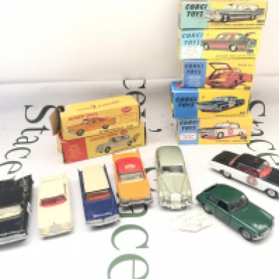 A Collection of Boxed Corgi Diecast In Repro Boxes And 2 Dinky Cars In Original Boxes. No Reserve.