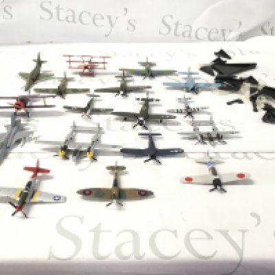 A small collection of metal model military aircraft. Stands included. No reserve.