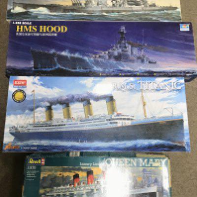4 X Boxed Model Kits. A Trumpeter HMS Hood 1/350 Scale. A Academy RMS Titanic 1/400 Scale. A Revell Queen Mary 1/570 Scale (Parts Missing) And A Part Built Tamiya King George V1/350 Scale. No Reserve. (4).