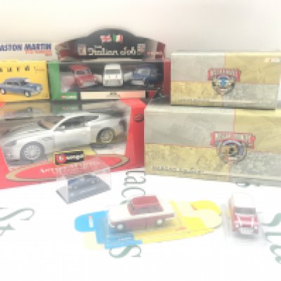 A Collection of Boxed Diecast Including Burago. Corgi. Vanguards And NASCAR.