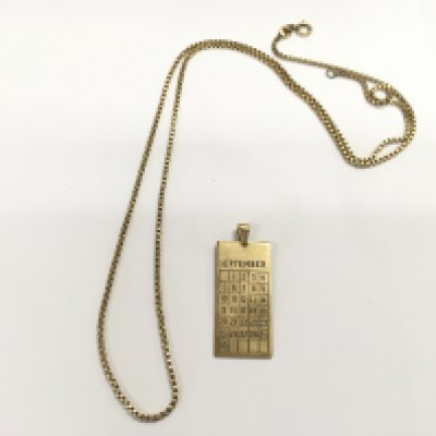 A 9ct gold September pendant 4.32g and a 14ct gold chain 8.46g