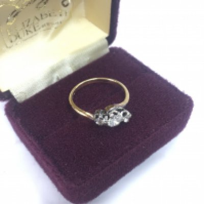 An 18ct gold and platinum 1930s twist diamond set 60 pts ring , total weight 3.38g. Size P/Q. Postage category A