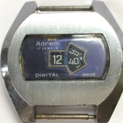 An Andem 17 jewels watch (no strap) with a novelty American football watch with a broken hand and no strap. Postage category A NO RESERVE
