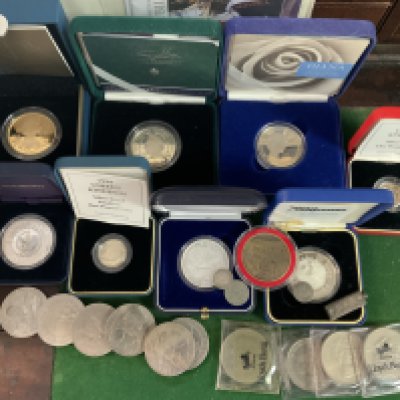 A collection of silver proof and piedfort proof coins and nickel silver crowns.
