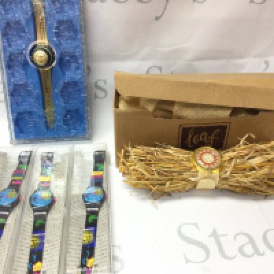 A collection of swatch watches including 1990s leaf and celebrate life swatch etc all with original packaging. Postage B
