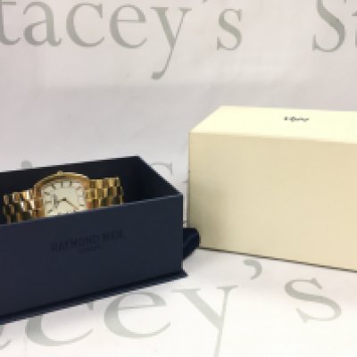 A boxed Gold Plated Raymond Weil gents watch, postage category B