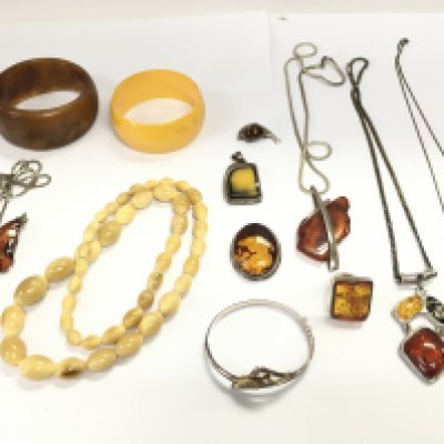 A collection of assorted jewellery including amber and silver etc. Postage B