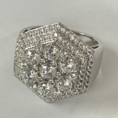 Large silver ring pave set with hundreds of white round cubic zirconia to the head and shoulders. Postage category A.