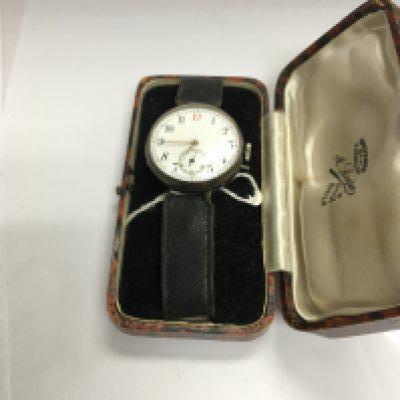 A vintage silver cased wrist watch.
