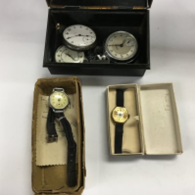 Two wrist watches and four pocket watches.