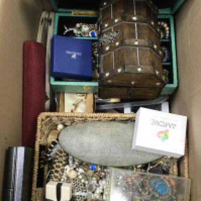 A large box of costume jewellery including necklaces, brooches etc
