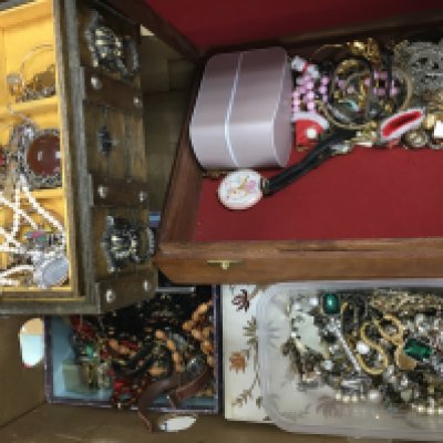 A large box of costume jewellery including necklaces, brooches, watches etc. postage cat C