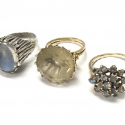 Two 9ct gold dress rings (size O & P) and a silver moonstone ring (size O). Postage category A