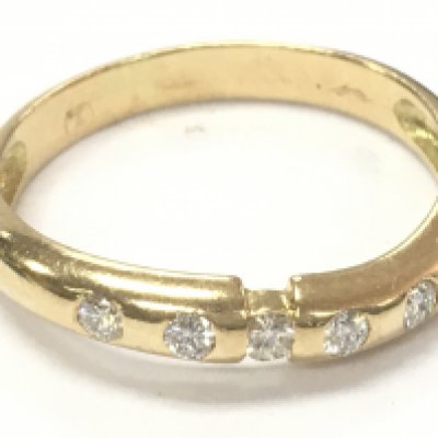 An 18ct gold 5 stone diamond ring , size R. 3.2g Postage category A