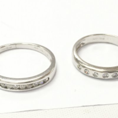Two 18ct white gold diamond 1/2 hoop rings. Size P & L. Total weight 5.2 g Postage category A