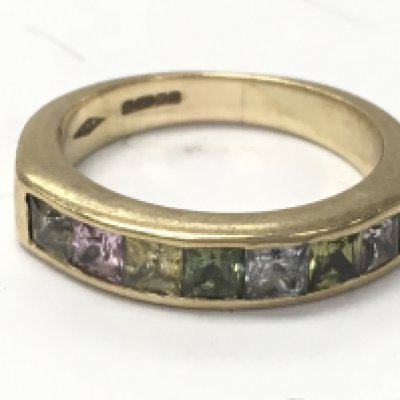 A 9ct gold multi stone 1/2 hoop ring , size L. 4.2g . Postage category A