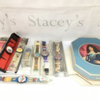 A collection of assorted swatch watches including some 1996 Olympic versions. Postage B