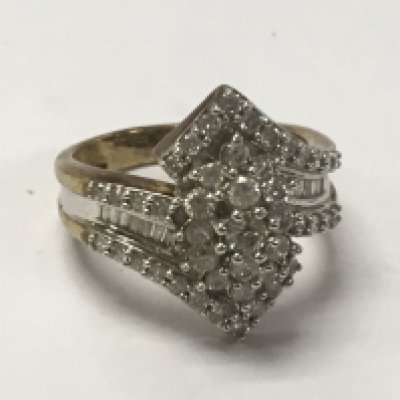 A 9ct gold fancy diamond cluster ring , 5.4g total weight. Postage category A