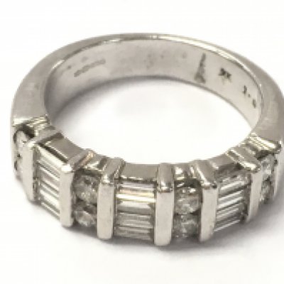 A 9ct white gold baguette / round cut diamond cluster ring, size M, 6.2g. Postage category A