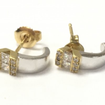 A pair of 18ct yellow and white gold diamond earring studs, 3.5g total weight. Postage category A
