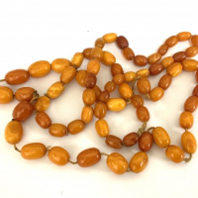 A vintage string of Butterscotch amber beads. (A)