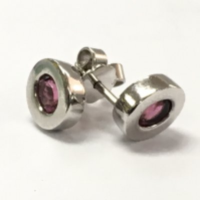 Platinum pink stone stud earrings , 6.3g. Postage category A.