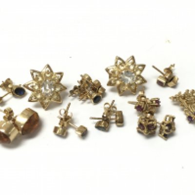 A collection of 9ct gold earrings. 15.4g total weight Postage category A