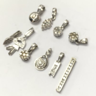 9ct white gold diamond pendants , total weight 10.1g. Postage category A