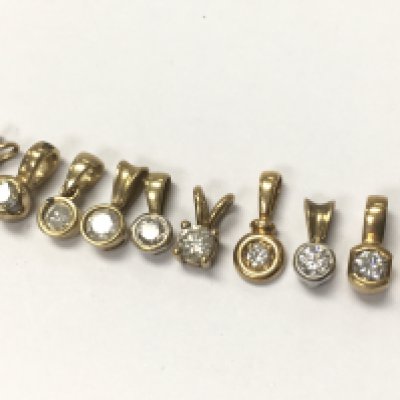 9ct gold Diamond solitaire pendants , Total weight 6.3g . Postage category a