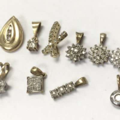 9ct gold mixed diamond , 7.3g total weight. Postage category A