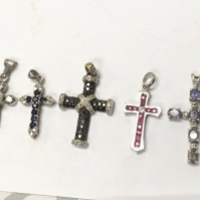 9ct white gold cross pendants with stones and diamonds. 8.5g total weight. Postage category A