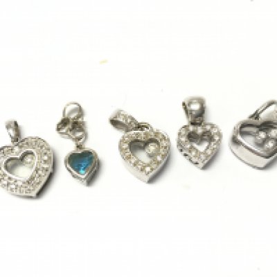 A collection of 18ct white gold heart pendants, 12.5g total weight. Postage category A