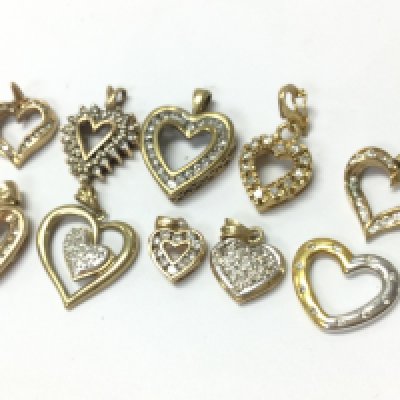9ct diamond heart pendants , 21.1g total weight, postage category A