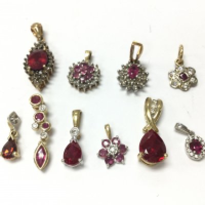 9ct gold ruby and diamond set pendants , 11g total weight. Postage category A