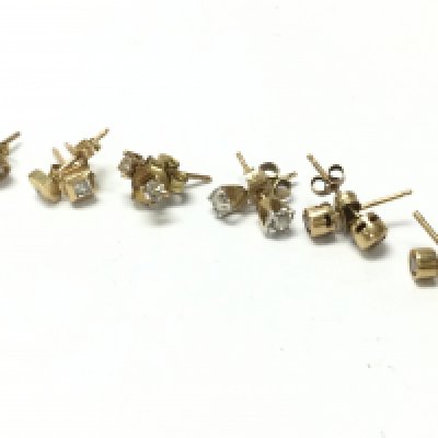 9ct Gold earrings set with diamond stones,4.77g total weight. Postage category A
