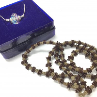A Swarovski silver chain necklace with glass pendant and a beaded bracelet , postage category A