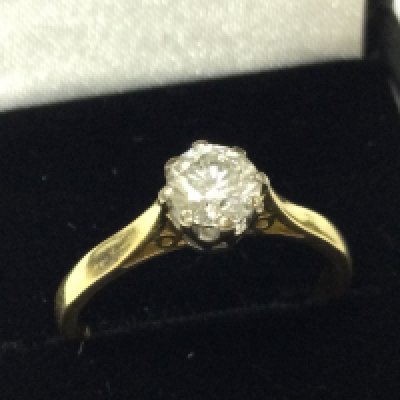 An 18ct gold 1/2 carat diamond ring , size L, 2.55g postage category A