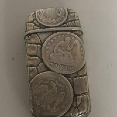 An interesting unique silver white metal vesta cases and made with American 19th century coinage 1854 1858