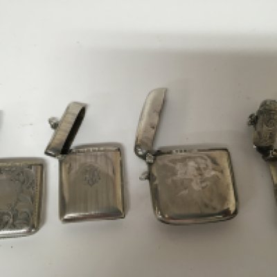 Four silver Vesta cases dated 1911 and 1912 and two other silver Vesta cases. (4)